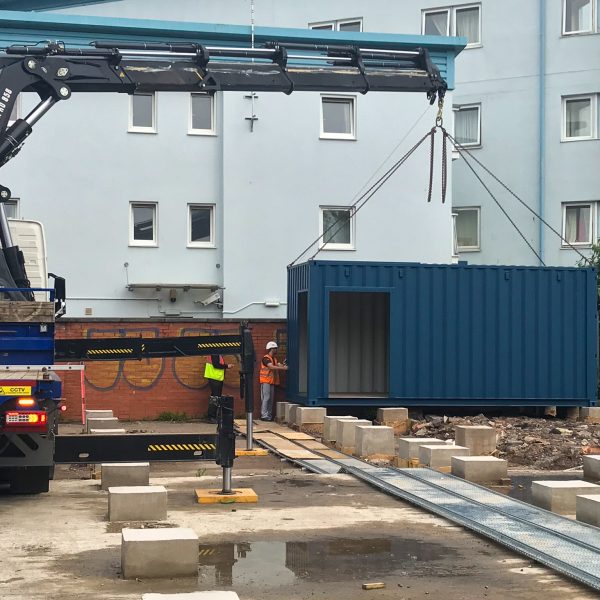 20ft container being lifted into place 20ft container being lifted into place